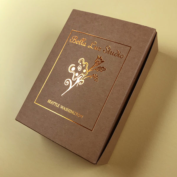 Luminette box with shiny copper design